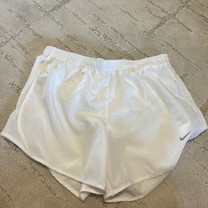 White Nike shorts